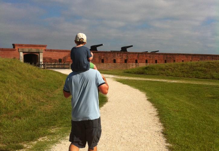 Visitors exploring Fort Clinch interior courtyard